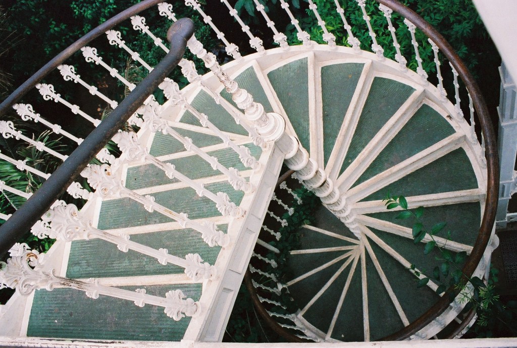 A whitewashed spiral staircase