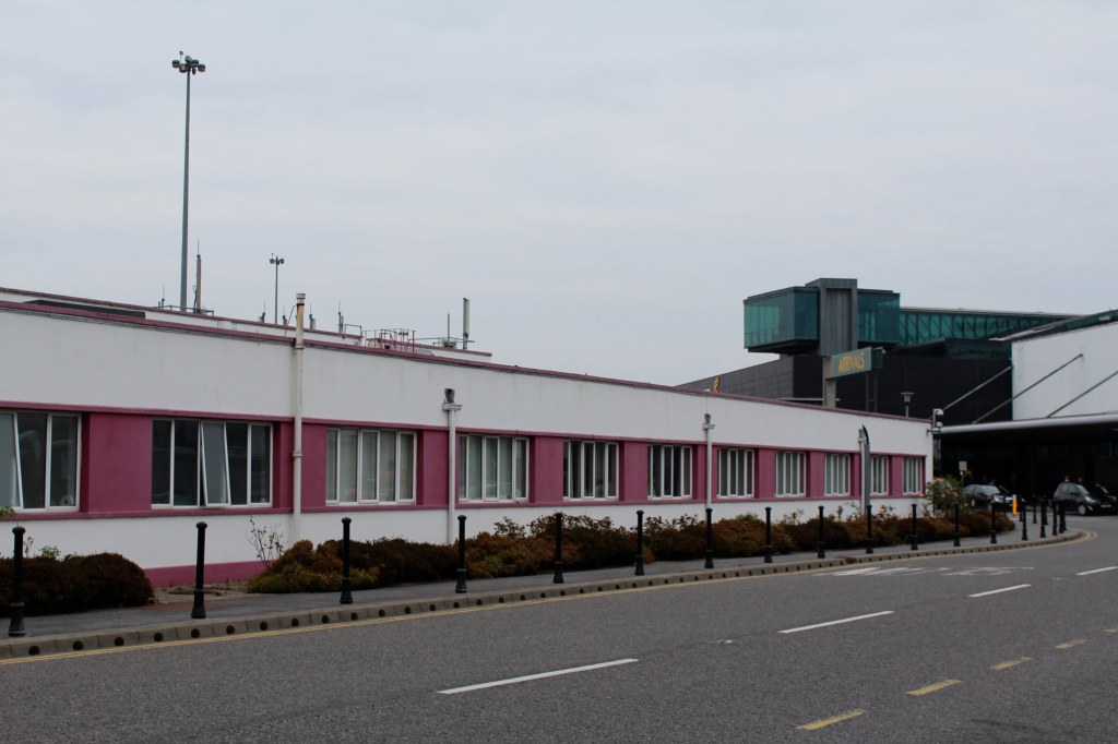 Purple and white painted building outside Shannon Airport, Ireland