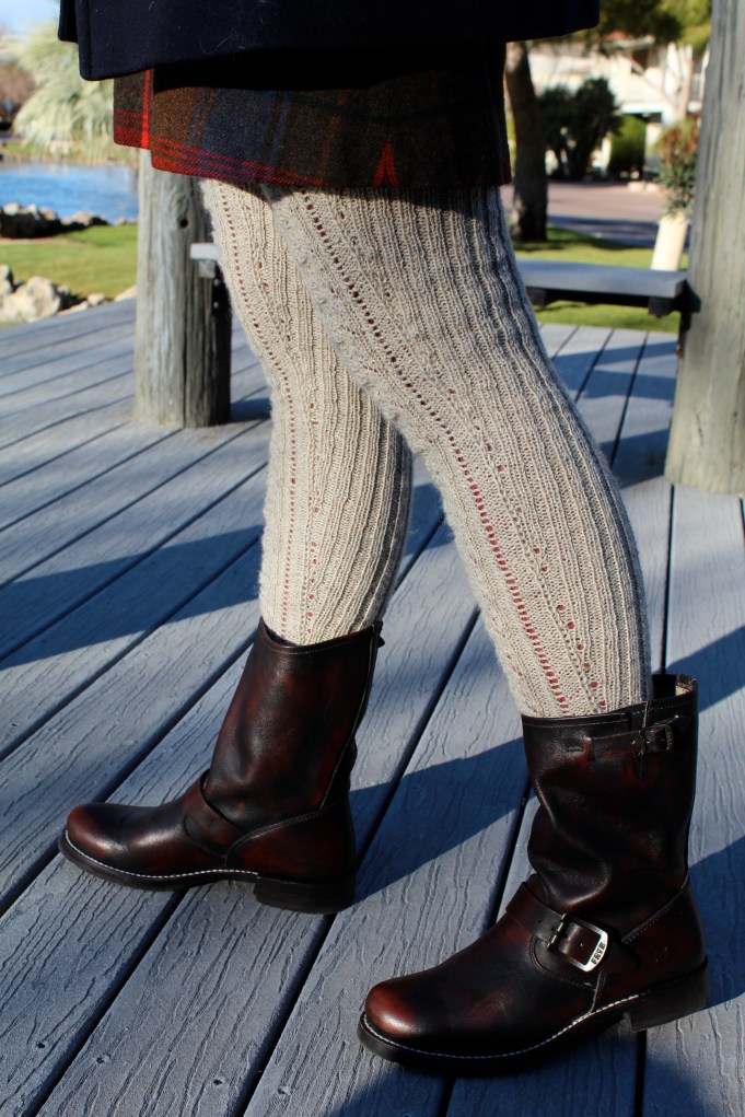 Check out how the ribbing grows out of eyelet increases.  Lots of eyelet increases.