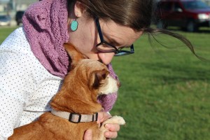 Woman kissing a chiweenie