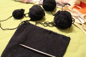 Dark blue knitting on lime sheet
