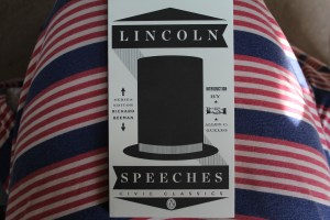 Black and white copy of Lincoln's speeches on a red, white, and blue dress