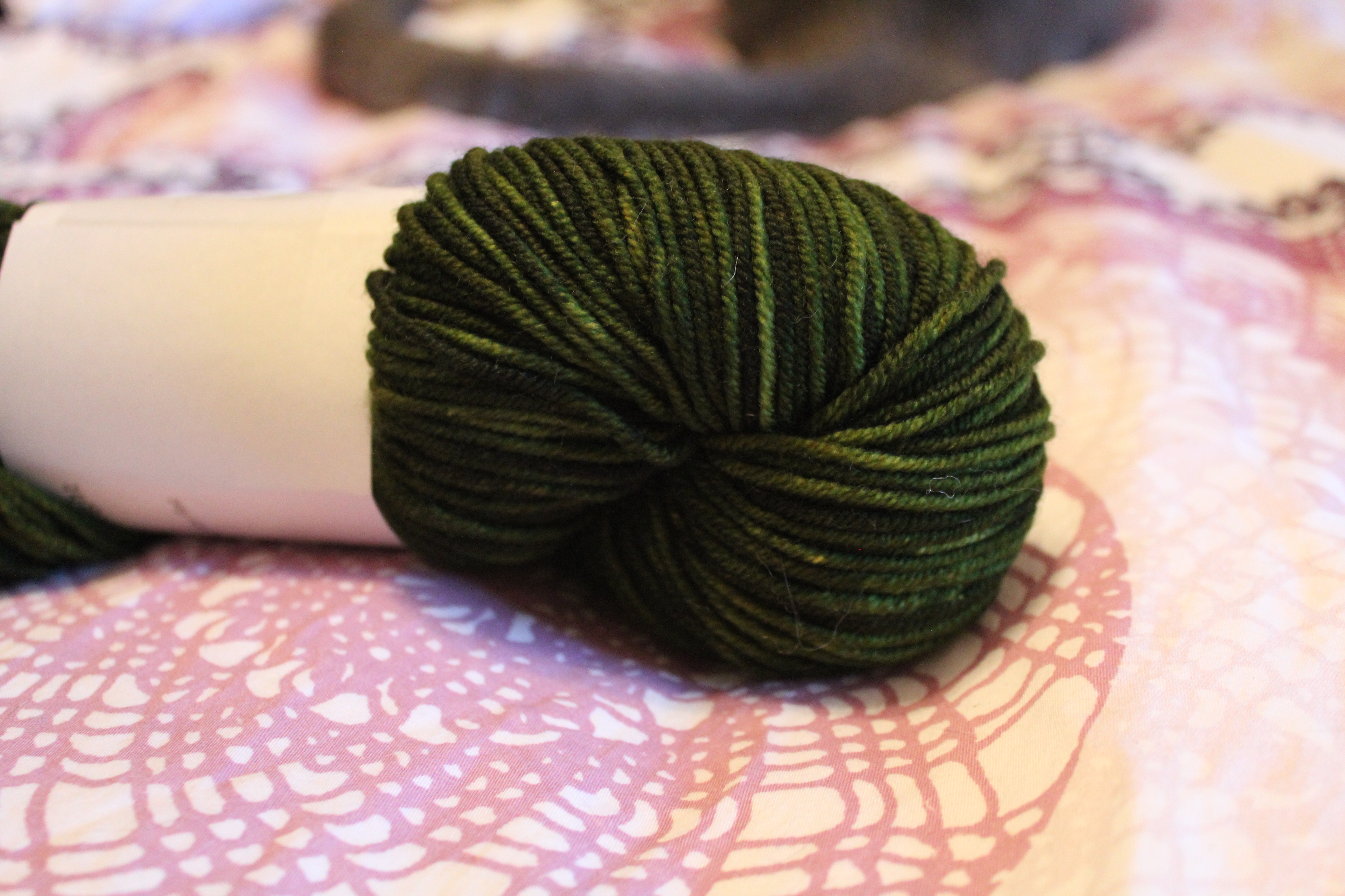 Treasure Goddess yarn in a rich semisolid forest green