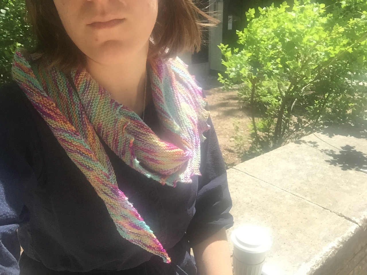 Woman wearing a Hitchhiker shawl