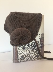 Baby Leia bonnet incorporating the Anime Character bonnet and Nautie knitting patterns