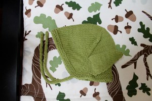 Baby Yoda bonnet with improvised ears on an Anime Character bonnet