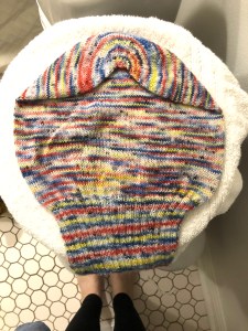 Sockhead Slouch hat blocking on a hamper