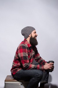 Image of a male model wearing the Rist Canyon Beanie by Meghan Huber, image copyright Knitscene