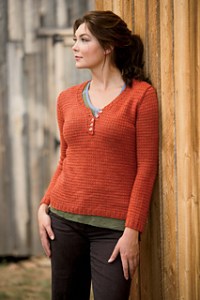 Image of a model wearing the Vercheres Pullover by Heather Zoppetti, image copyright Interweave Knits
